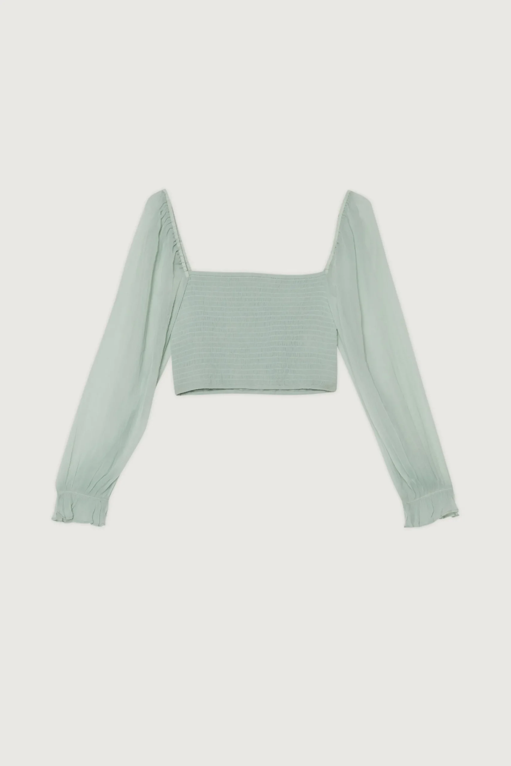 SMOCKED RUFFLE SLEEVE BLOUSE